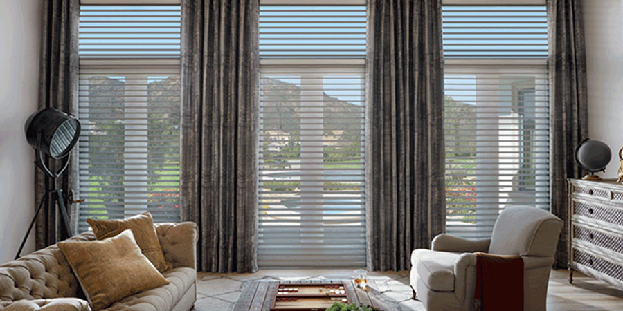 Silhouette shades on floor-to-ceiling windows for view and light control