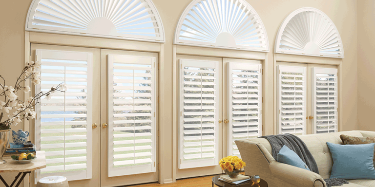 french doors with plantation shutters for arched window treatments Milwaukee