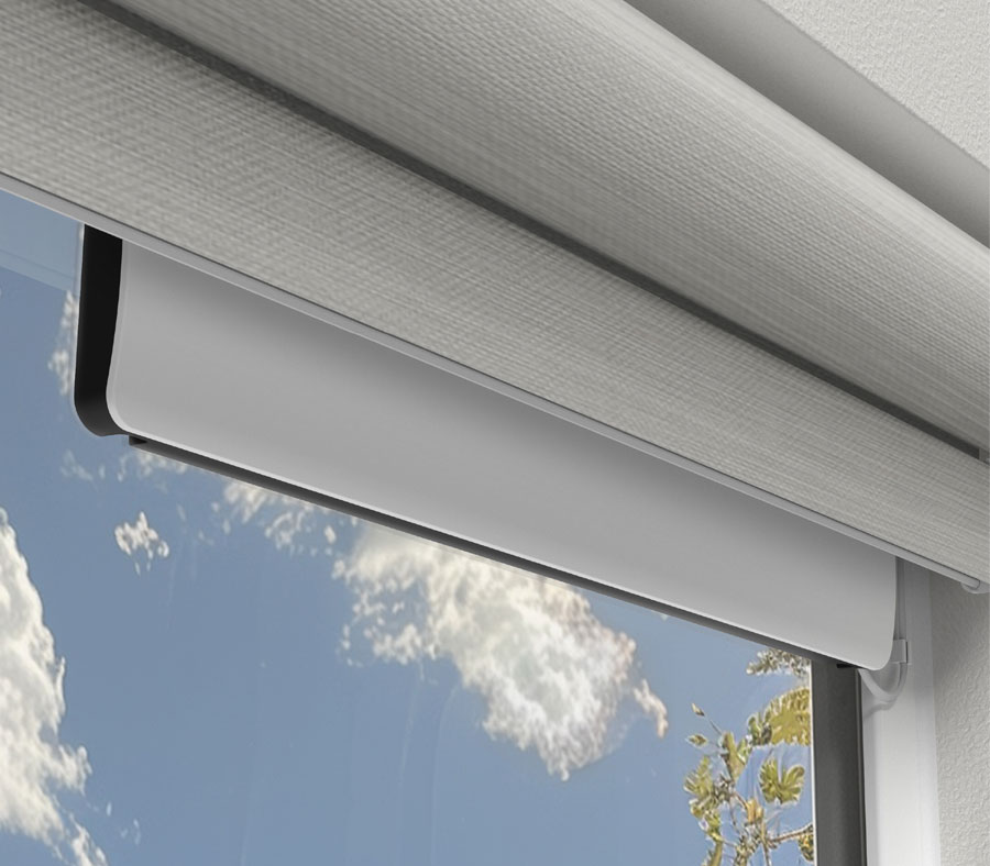 Hunter Douglas PowerView solar charger installed in window with light gray shades