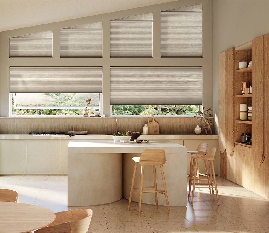 specialty shaped windows with modern cellular honeycomb shades in contemporary kitchen