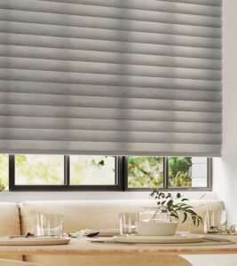 close up view of energy efficient sonnette window shades in a soft dove gray fabric in Milwaukee, WI home