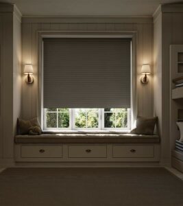 room darkening and blackout shade halfway down in bedroom with bunk beds