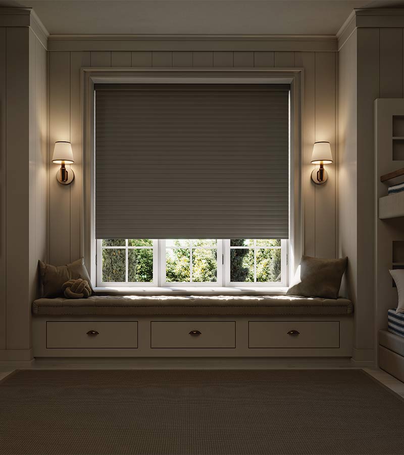 room darkening and blackout shade halfway down in bedroom with bunk beds