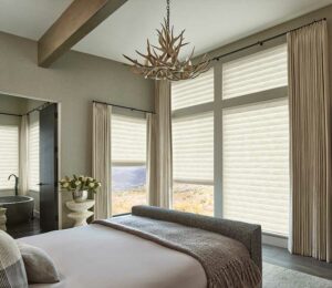 Vignette Roman Shades on bedroom windows with LED strip lighting