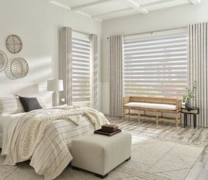 White Bedroom with Roller Zebra Shades on Windows with Side Drapes