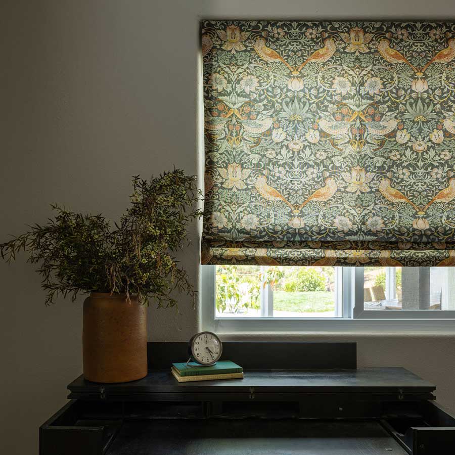 Roman shades in botanical fabric