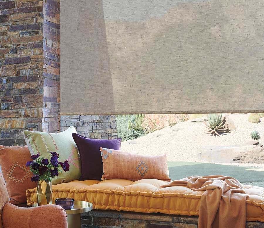 designer roller shades near window seat in living room milwaukee bazaar home decorating