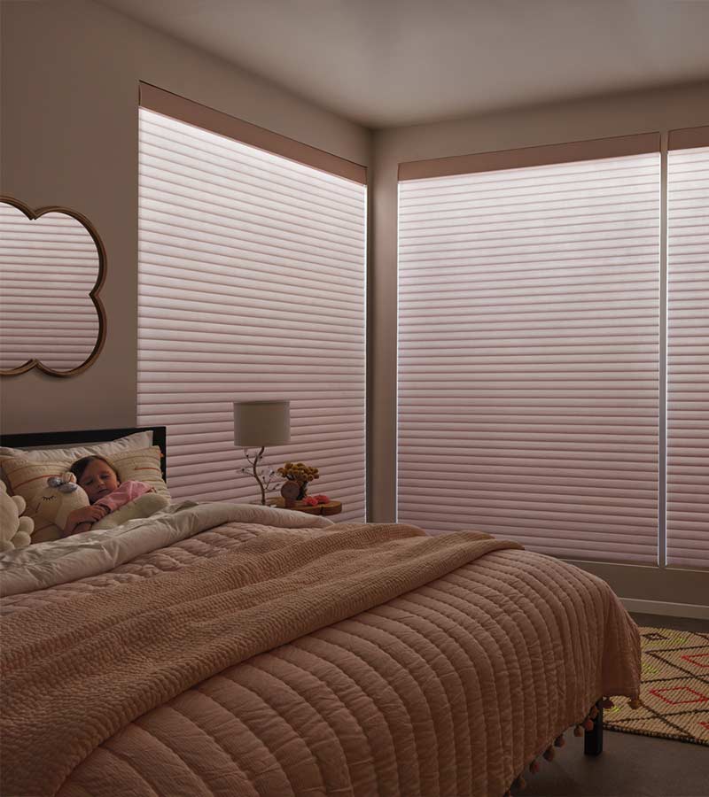 bedroom with aura illuminated shades