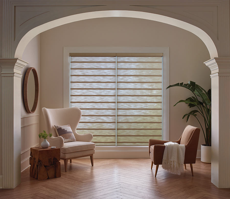 vignette-sheer-roman-shades-hunter-douglas-bazaar-home-decorating Softly filtered light through custom Roman shades