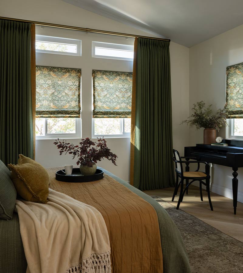 green drapery with roman shades in bedroom energy efficient