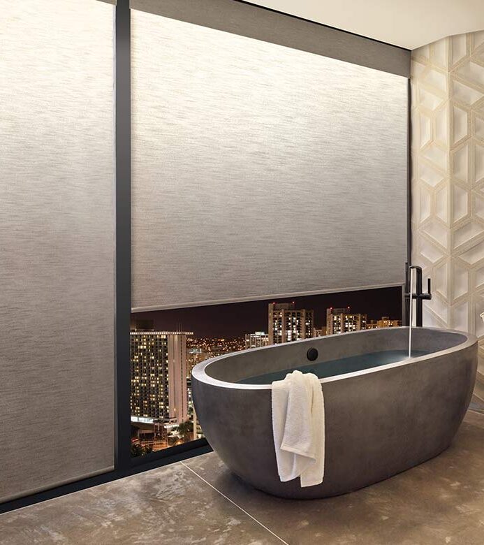 aura-illuminated-shades-master-bathroom-privacy-shades-lighted-hunter-douglas-bazaar-home-decorating illuminated shades offer interior light when roller shades are lowered in Milwaukee, WI home