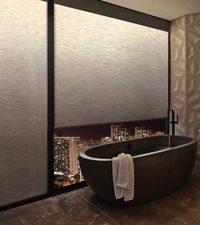 aura-illuminated-shades-master-bathroom-roller-shades-large-windows-hunter-douglas-bazaar-home-decorating warm interior ambient lighting from LED strips lighting on window shades