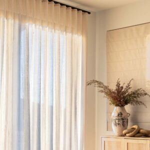 custom-drapery-and-coordinating-roman-shade-to-filter-harsh-sunlight-for-bright-living-room-hunter-doulas-bazaar-home-decorating custom-drapery-and-coordinating-roman-shade-to-filter-harsh-sunlight-for-bright-living-room-hunter-doulas-bazaar-home-decorating